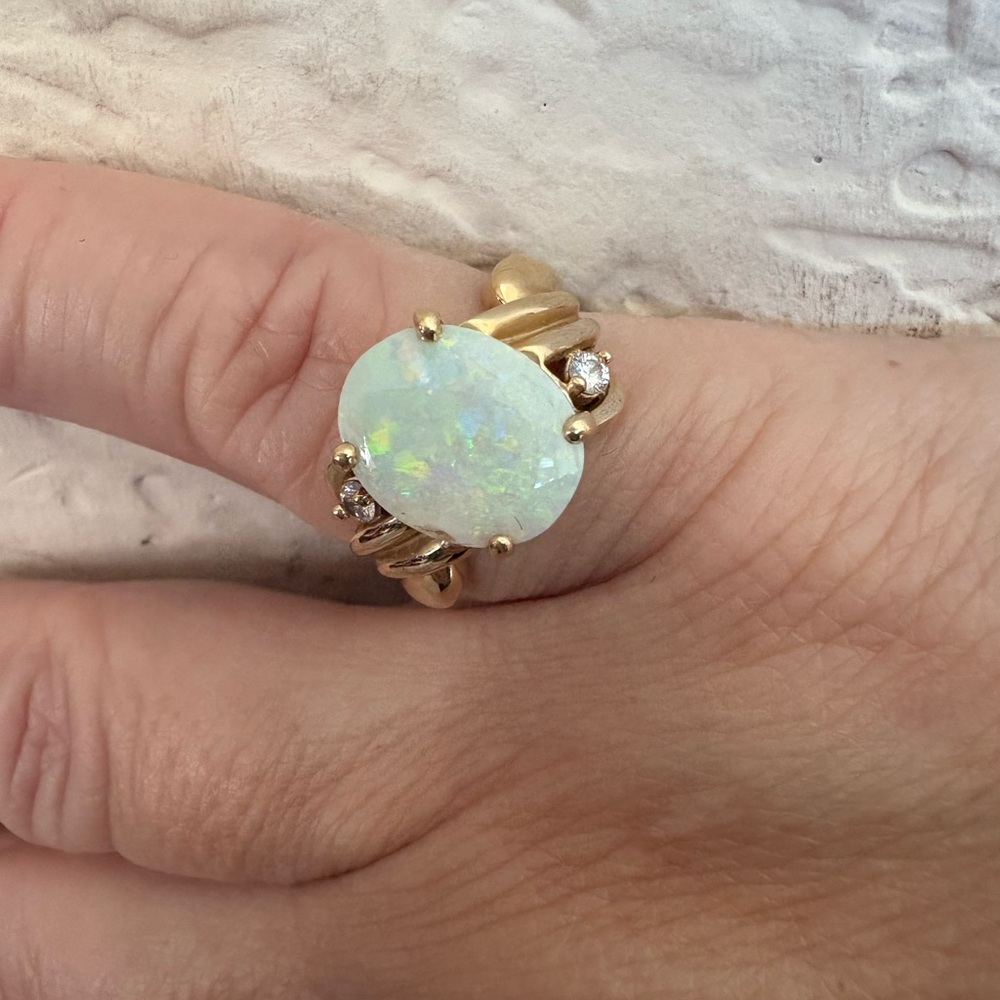 Elegant Opal & Diamond Ring in 14 kt Gold setting  size 7